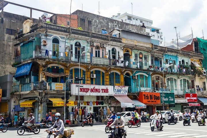 Insiders Saigon Vespa Tour: Half-Day Markets, Monuments & Hidden Streets photo 2