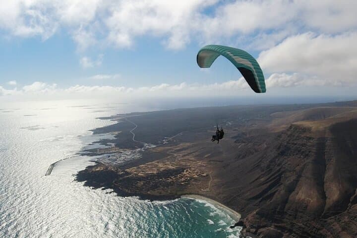 Discovery Flight: Tandem Paragliding Over Lanzarote's Lava Fields and Atlantic