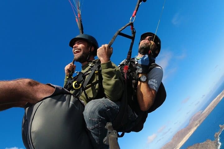 Rollercoaster Tandem Paragliding in Lanzarote — Ocean and Lava Flights photo 3