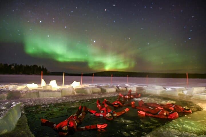 Ice Floating on a Forest Lake Under the Aurora Borealis in Rovaniemi photo 4