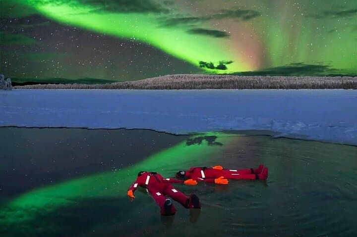 Ice Floating on a Forest Lake Under the Aurora Borealis in Rovaniemi photo 5