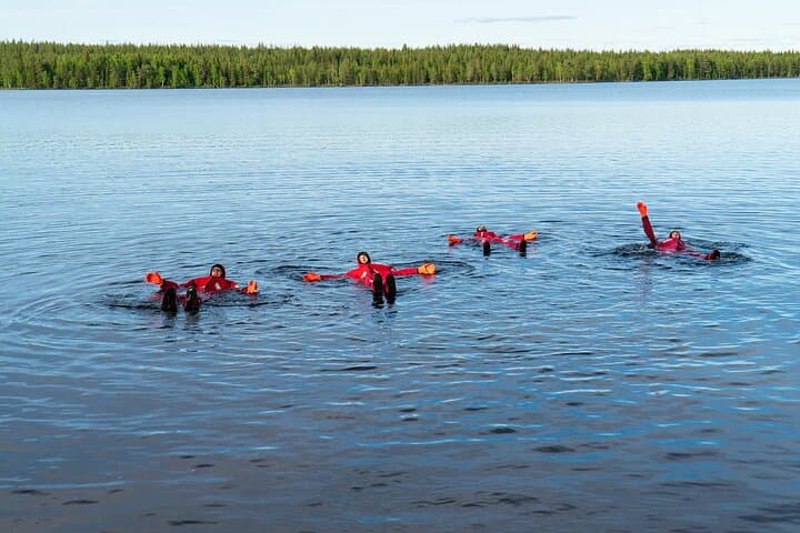 Midnight Sun Floating Experience on Forest Lake — Rovaniemi's 24-Hour Light photo 3