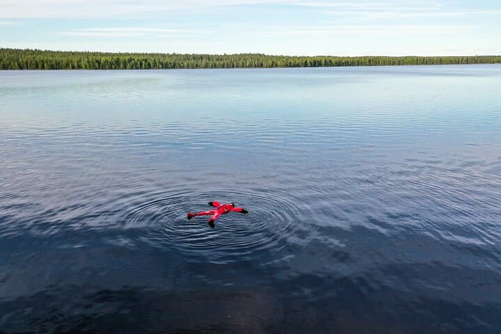 Midnight Sun Floating Experience on Forest Lake — Rovaniemi's 24-Hour Light photo 5