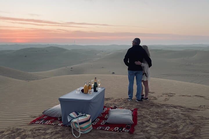 Sunrise Safari in Dubai Desert: Dawn Dune Drive & Sandboarding