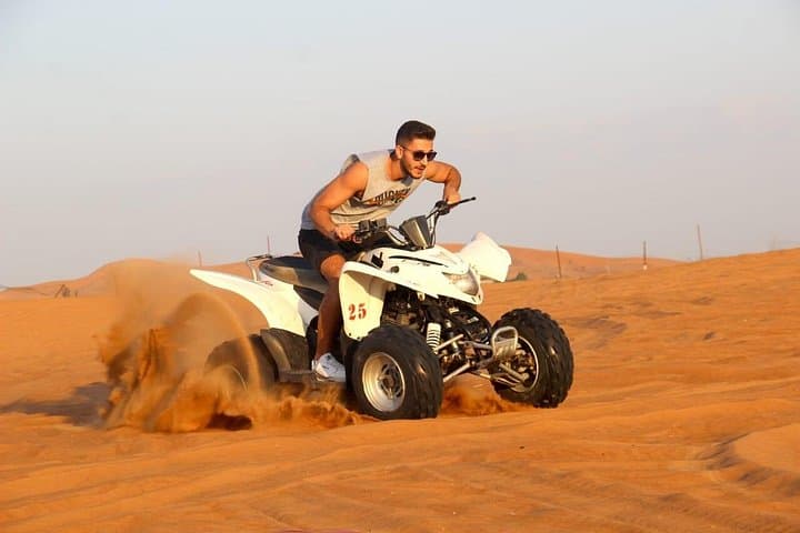 Red Dune Desert Safari: Quad Biking, Dune Bashing, Sandboarding & BBQ Sunset Experience