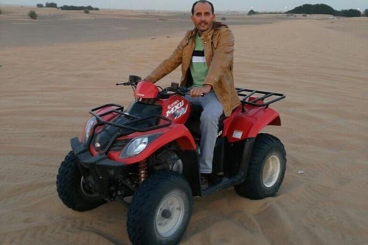Red Dune Desert Safari: Quad Biking, Dune Bashing, Sandboarding & BBQ Sunset Experience photo 3