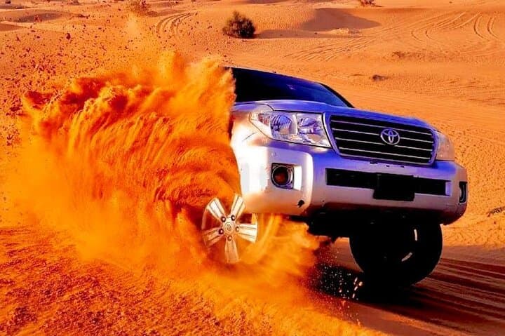 Evening Desert Safari at Lahbab Red Dunes — Dune Bashing, Camel Ride & BBQ photo 3