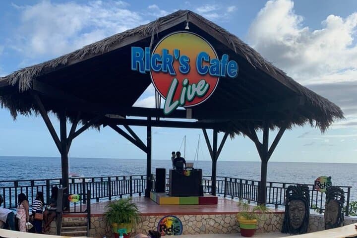 Explore Negril's 7 Mile Beach and Rick's Cafe in Style
