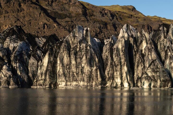 Iceland South Coast Private Full-Day Tour: Seljalandsfoss, Skógafoss & Solheimajokull photo 1
