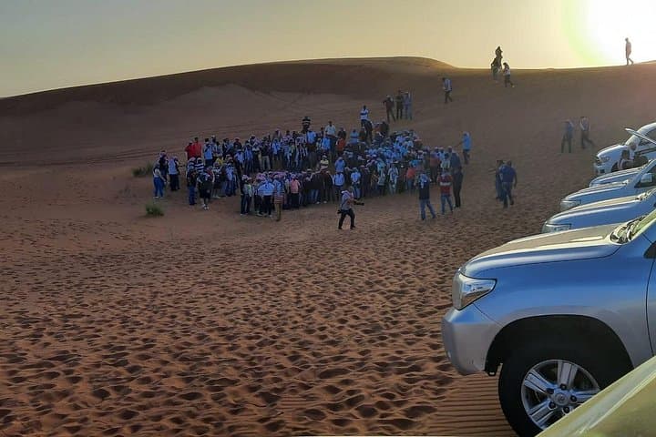 Evening Dubai Desert Safari: Sandboarding, Camel Ride & BBQ Under the Stars photo 2
