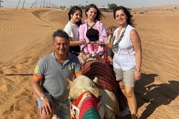 Evening Dubai Desert Safari: Sandboarding, Camel Ride & BBQ Under the Stars photo 4