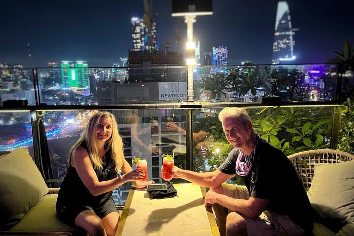 Saigon by Night: Private Jeep City Tour with Skybar Drink photo 3