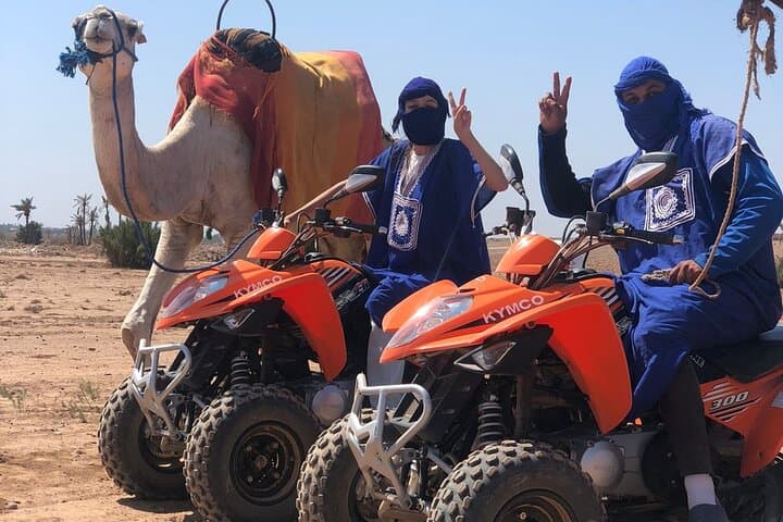 Sunset Quad and Camel Ride through Marrakech's Palm Grove