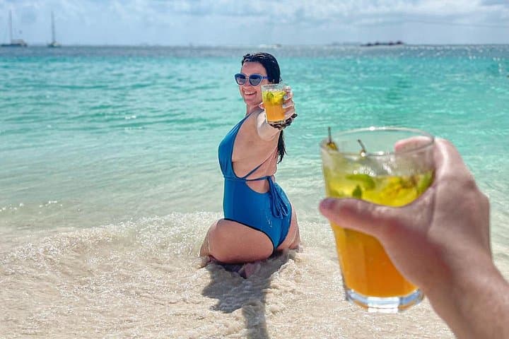 Catamaran Cruise from Cancun to Isla Mujeres: Snorkel, Beach Club & Sunset Party photo 1
