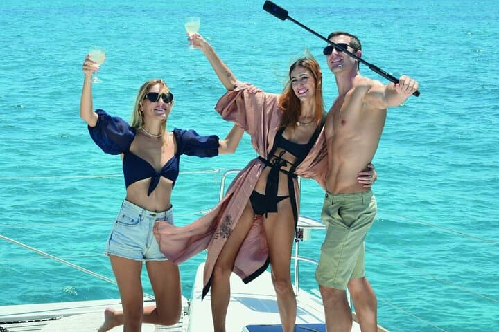 Luxury Catamaran to Isla Mujeres — Snorkel, Open Bar & Private Beach Club photo 1