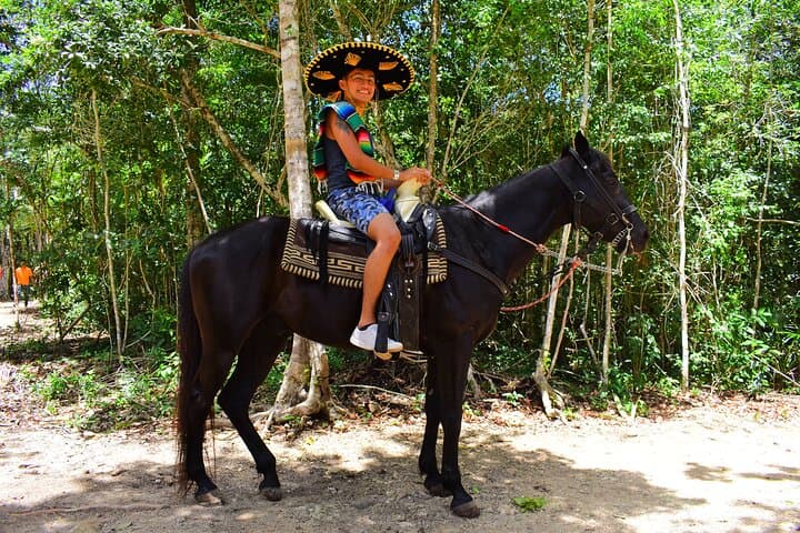 Mayan Jungle Half-Day: ATVs, Zipline, Horseback & Cenote Swim from Playa del Carmen