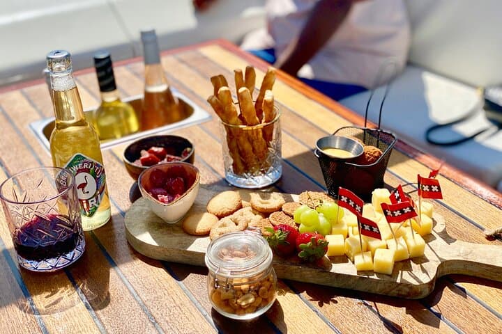 Glide Amsterdam’s Historic Canals: A Two-Hour Small-Group Cruise with Snacks and Drinks photo 4