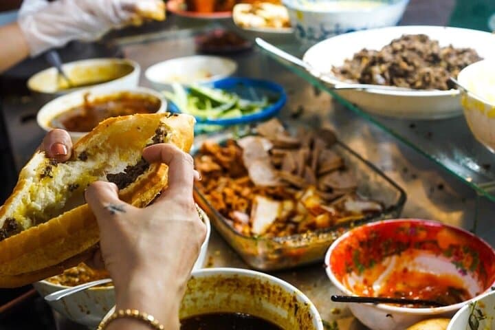 Hoi An Hidden Food Adventure: Evening Walking Tour & Lantern River Stroll photo 2