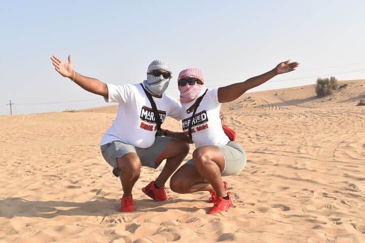 Dubai Desert ATV & 4x4 Dune Safari with BBQ, Shows and Camel Ride photo 4