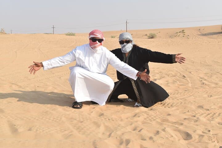 Dubai Desert ATV & 4x4 Dune Safari with BBQ, Shows and Camel Ride photo 5