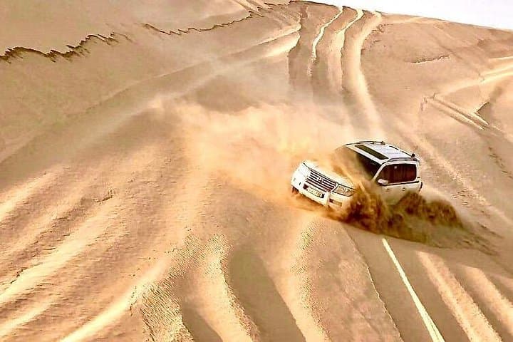 Doha Layover Desert Safari: Dune Bashing, Camel Ride & Inland Sea in 4 Hours photo 3