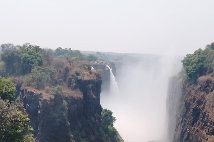See Both Sides of Victoria Falls: Helicopter, Falls Walks & Livingstone/Livingstone Combo photo 4