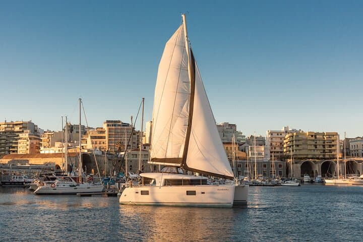 Private Catamaran Cruise Santorini — 5-Hour BBQ, Swimming & Volcano Hot Springs photo 3