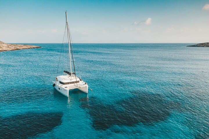 Private Catamaran Cruise Santorini — 5-Hour BBQ, Swimming & Volcano Hot Springs photo 4