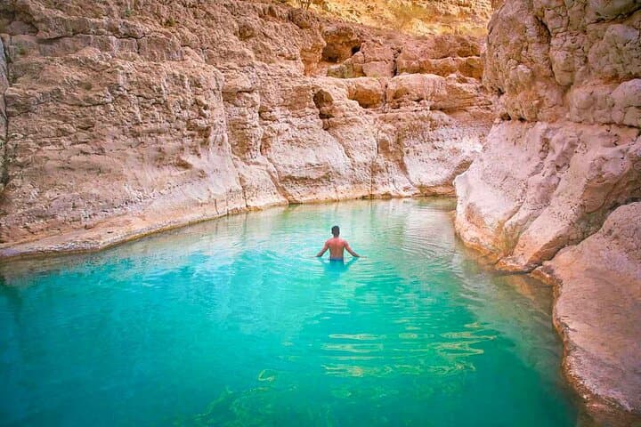 Full-Day Wadi Shab and Bimmah Sinkhole Tour from Muscat: Hike, Swim, and Hidden Caves photo 3