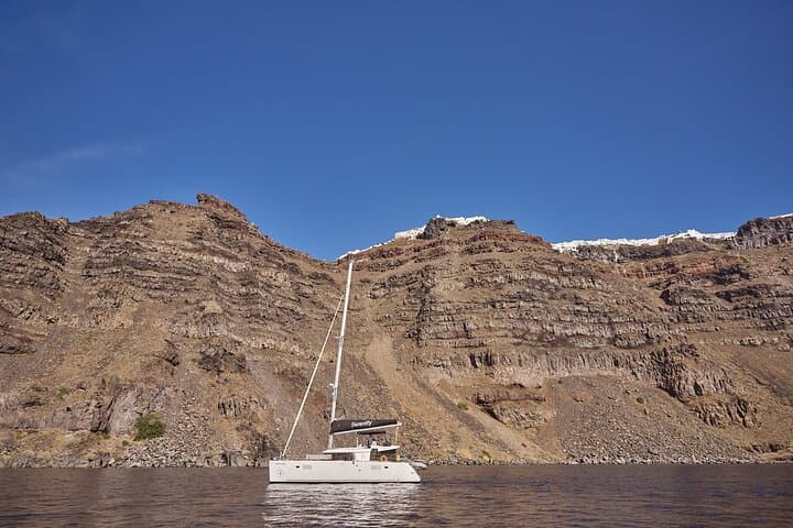 Santorini Oia Caldera Luxury Day Cruise with BBQ, Snorkeling & BBQ Feast photo 2