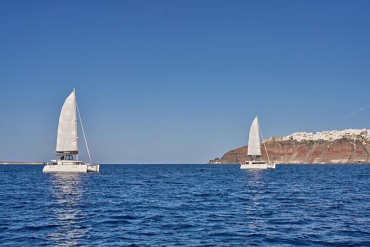Santorini Oia Caldera Luxury Day Cruise with BBQ, Snorkeling & BBQ Feast photo 3