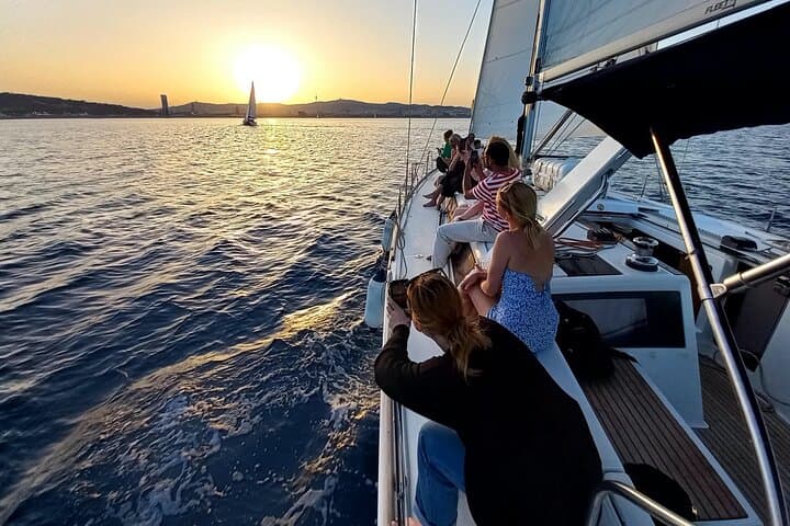Sunset Sailing in Barcelona: Port Olímpic Cruise with Open Bar