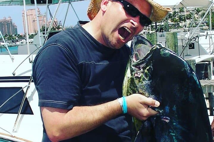 Private Nassau Charter: Snorkel, Swim with Turtles & Pigs, and Fish from a 35' Donzi photo 3