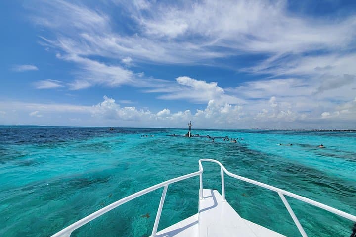 Isla Mujeres Day Trip: Snorkel the Shipwreck and Drive a Golf Cart photo 1