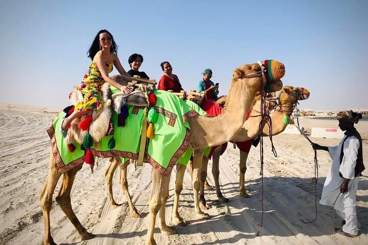 Sunset Camel Trekking on Qatar's Sealine Dunes photo 2