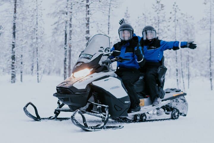 Levi family snowmobiling, husky & reindeer farm day trip photo 2