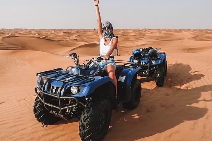 Dubai Desert Safari: Quad Bike, Camel Ride & BBQ Dinner Experience photo 6
