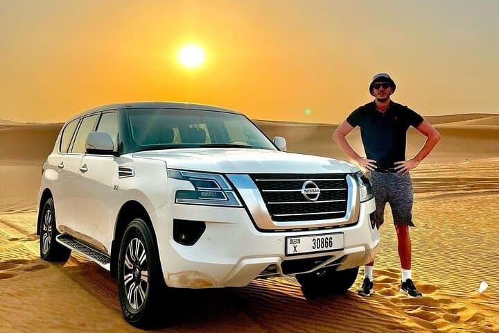 Dubai Desert Safari: Dune Buggy Sunset, Camel Ride & Camp Dinner Experience photo 2