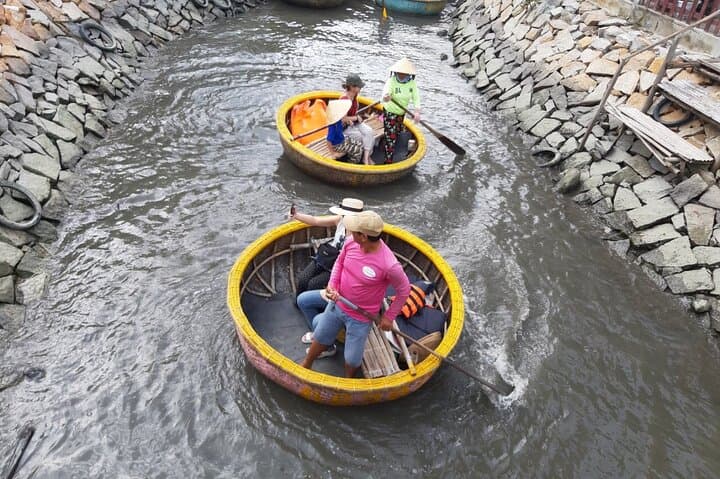 Basket Boat Ride Through Hoi An's Bay Mau Water Coconut Forest photo 2
