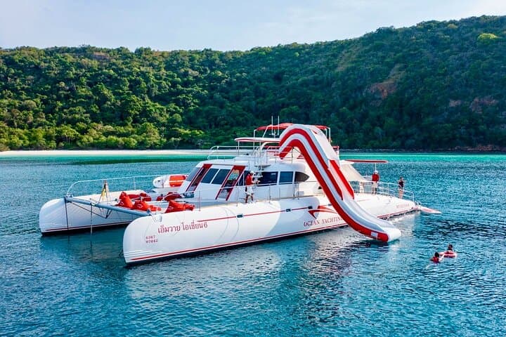 Pattaya Sunset Yacht to Koh Pai & Koh Rin — Full-Day Snorkel, Paddleboard & Buffet