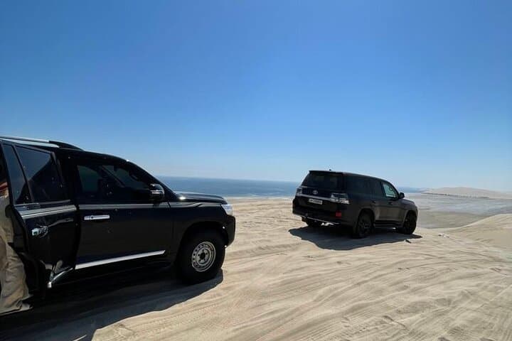 Doha Half-Day Sand Dunes Safari: Dune Bashing, Sandboarding & Camel Rides