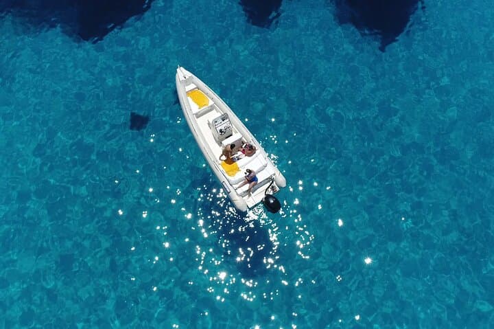 Private 4-Hour Boat Tour to Poliegos Island: Caves, Lighthouse & Snorkeling photo 2