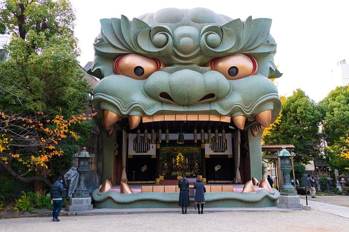 Osaka Unveiled: Private Walking Tour from Shinsaibashi to Namba Shrine photo 6