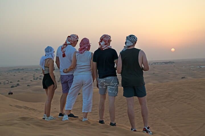 Abu Dhabi Evening Desert Safari: Dune Bashing, Camel Ride & BBQ Dinner photo 4