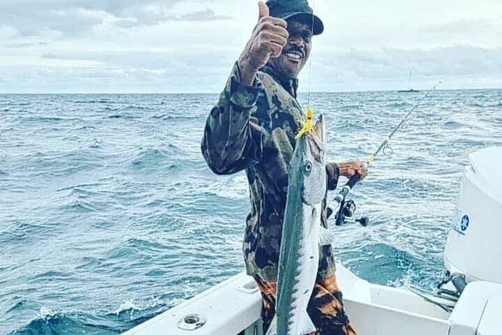 Private Nassau Charter: Snorkel, Swim with Turtles & Pigs, and Fish from a 35' Donzi photo 2