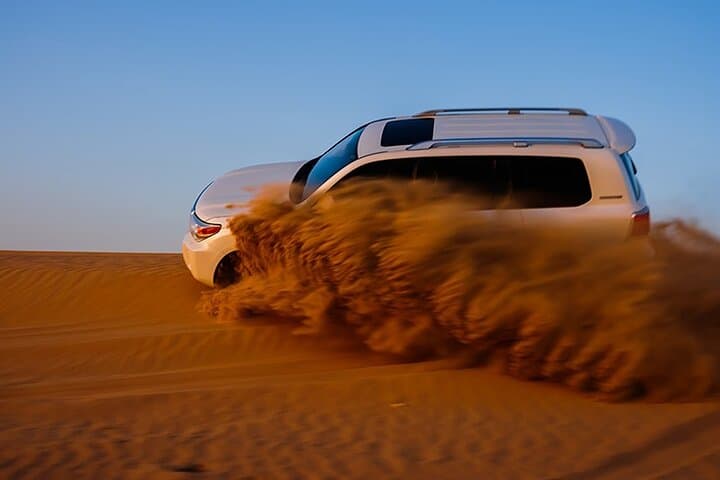 Evening Dubai Desert Safari: 4x4 Dune Bashing, Camel Ride & BBQ Under the Stars