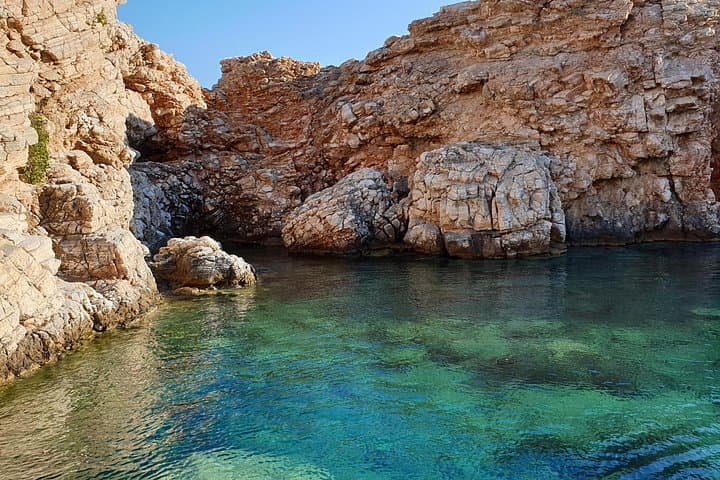 Antiparos & Despotiko Day Cruise from Paros — Swim Caves, Cliffs & Traditional Lunch photo 2