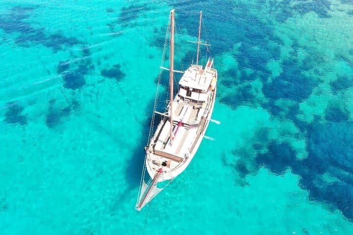 Antiparos & Despotiko Day Cruise from Paros — Swim Caves, Cliffs & Traditional Lunch photo 3