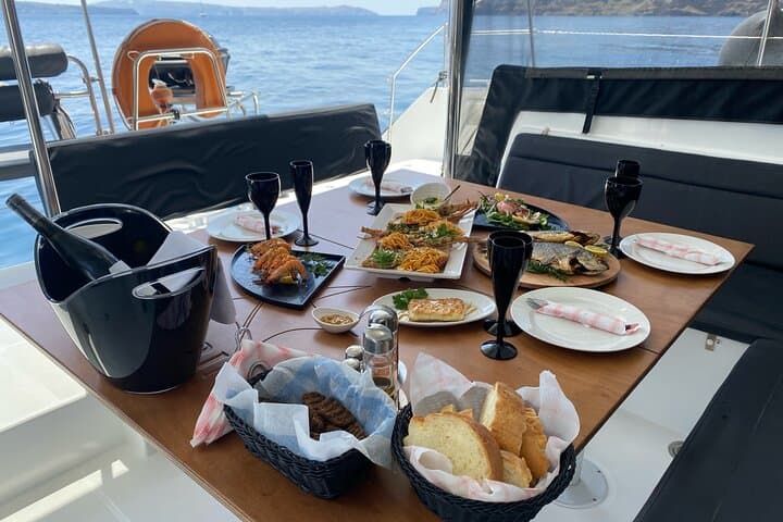Santorini Half-Day Premium Catamaran Cruise to Oia, Red Beach & Volcano photo 4
