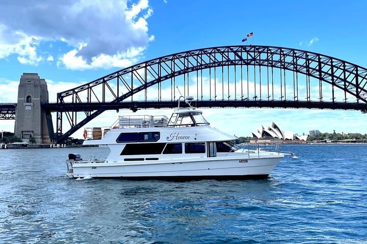 Vivid Sydney 90-Minute Harbour Catamaran Cruise — Canapés & Iconic Night Views photo 2